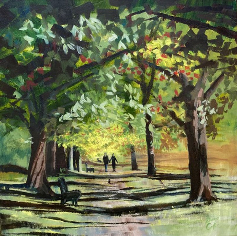 Dog walker under trees