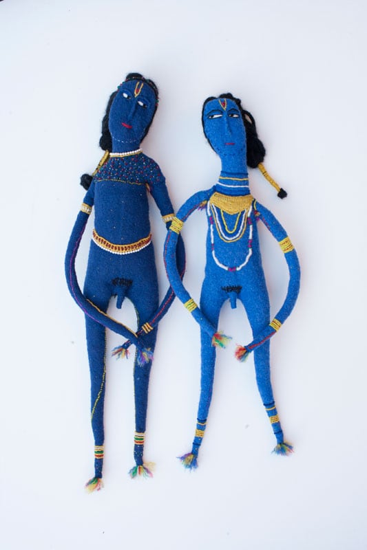 Two blue figures