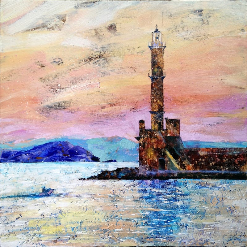 Lighthouse against a pink sky
